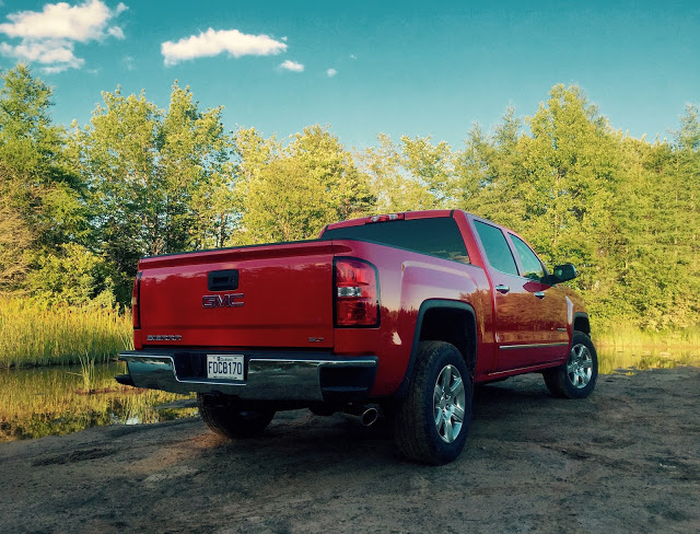 2015 GMC Sierra red crew cab rear