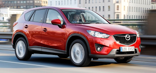 2013 Mazda CX-5 red driving