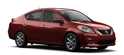 2013 Nissan Versa sedan red brick