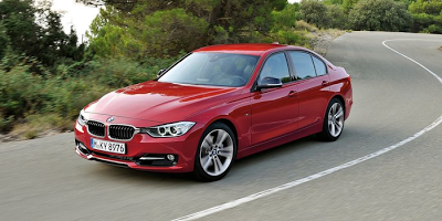 2012 BMW 3-Series red cornering