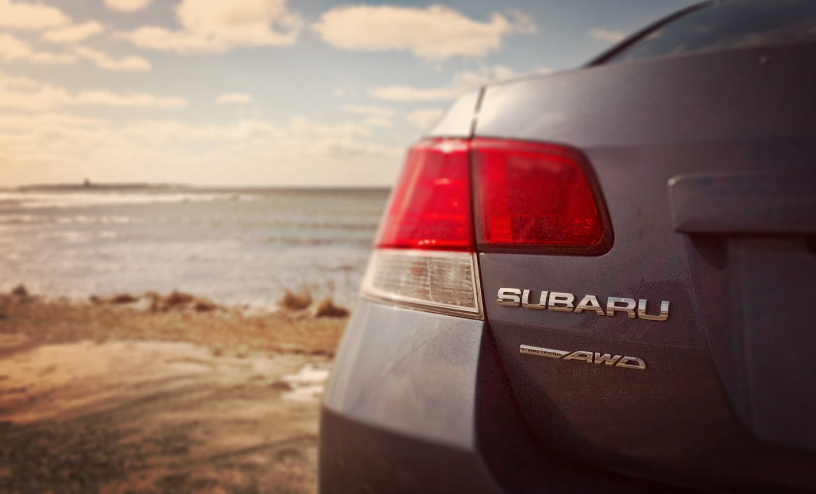 Subaru Legacy symmetrical AWD badge